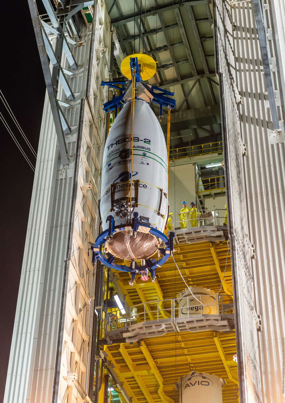 Vega upper composite being lifted onto launcher